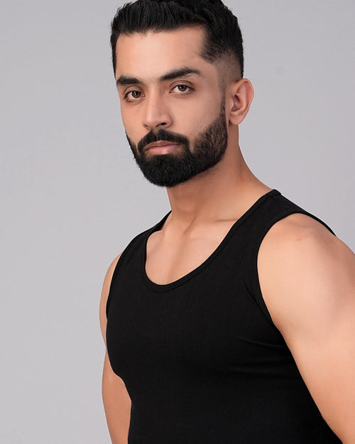 Men's regular fit black tank top made of 100% super combed ring spun cotton, showcasing a modern look.